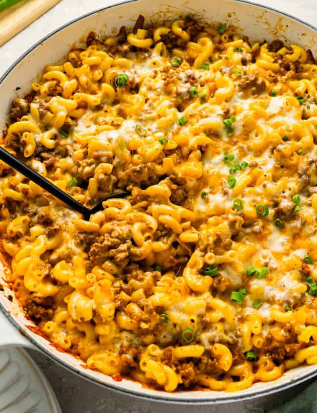 A pot of cheeseburger casserole stuffed with ground beef and macaroni.