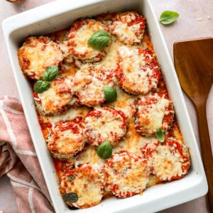 overhead view of eggplant parmesan in a baking pan.