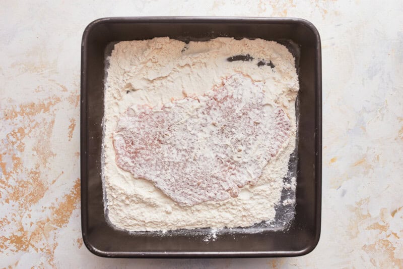 a thin pork cutlet dipped in flour.