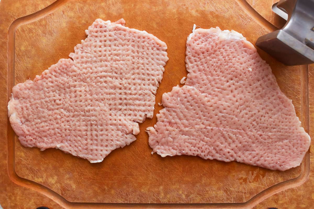 pork cutlets pounded thin with a meat mallet.