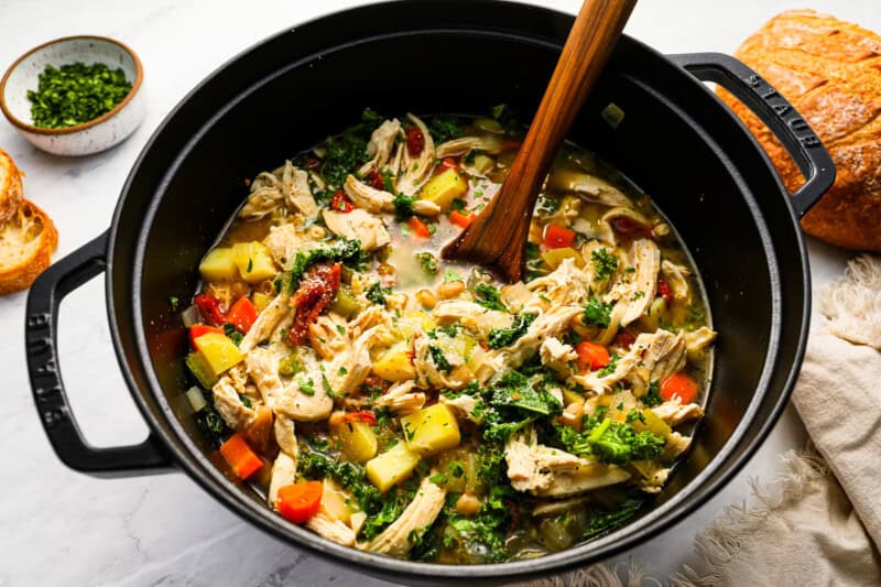 tuscan chicken soup in a dutch oven.