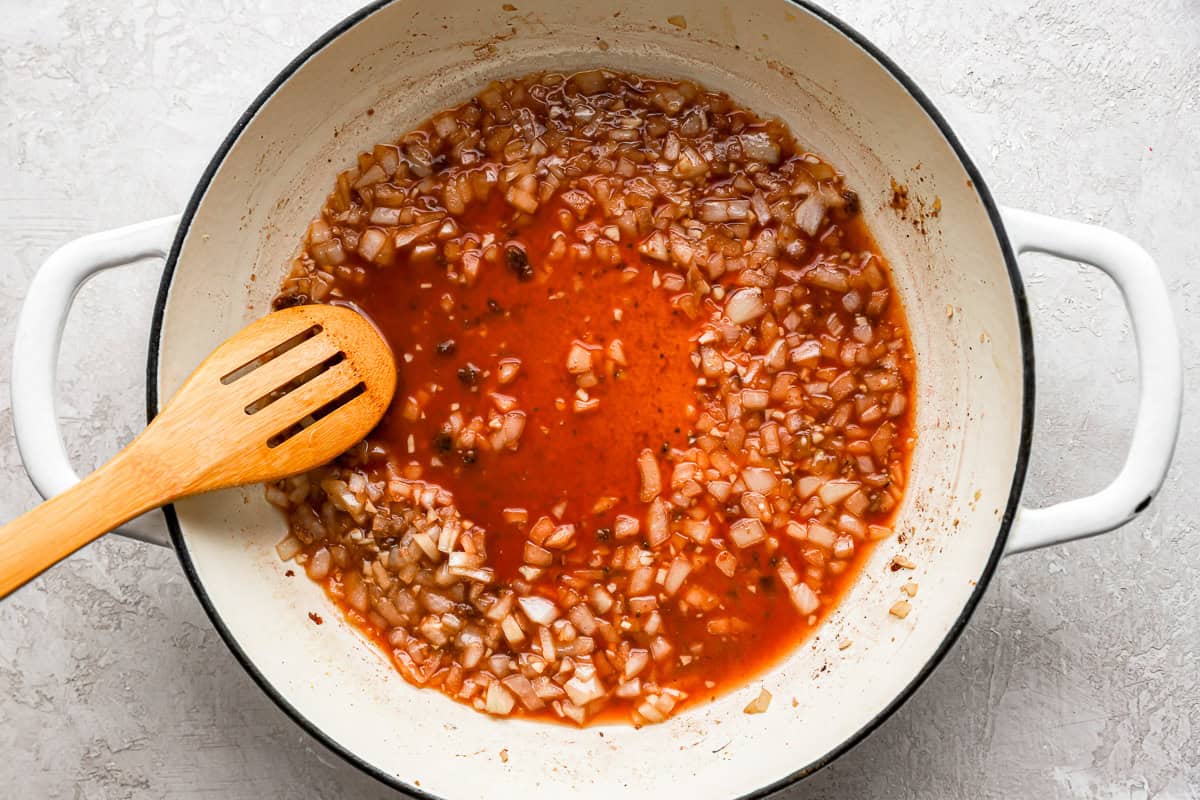 Onion cooking in a pot.