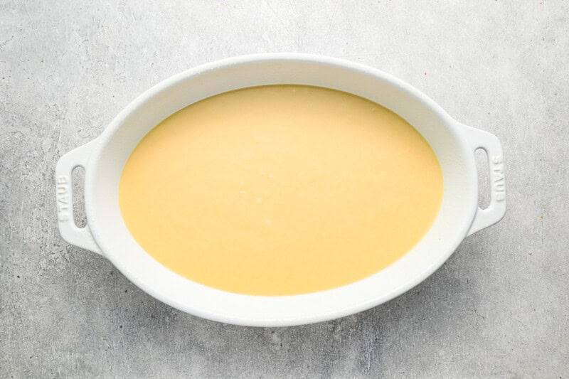 Batter in a white baking dish.