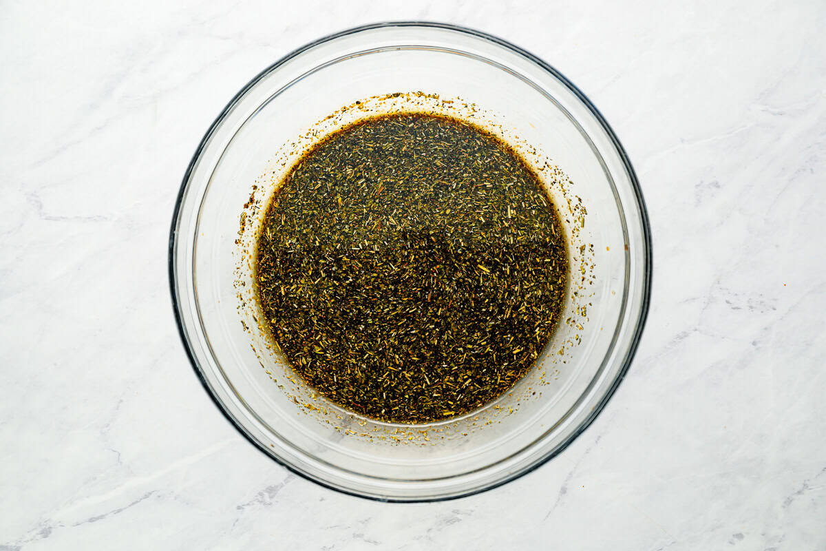 Honey balsamic marinade in a glass mixing bowl.