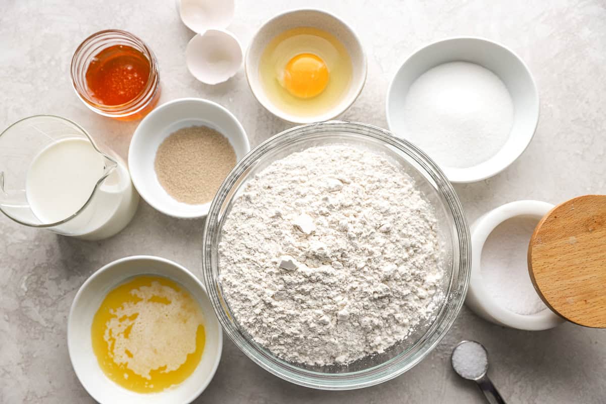 ingredients for texas roadhouse rolls in individual bowls.