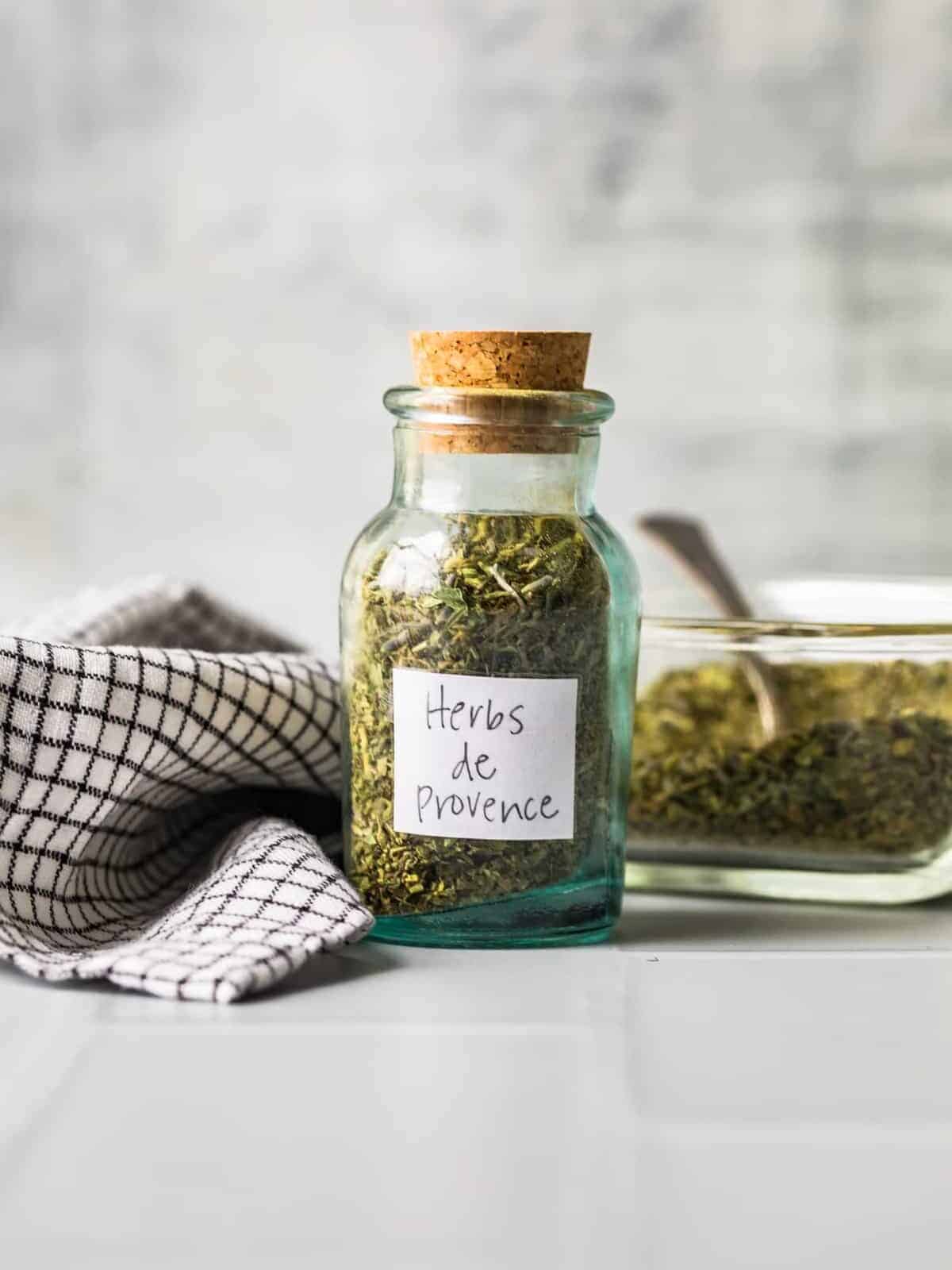 A jar of Herbs de Provence with a label