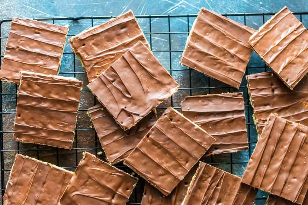 Chocolate Toffee Crackers on a baking rack top down. Saltine Cracker Toffee