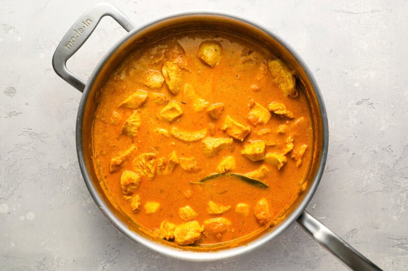 chicken curry in a pan.