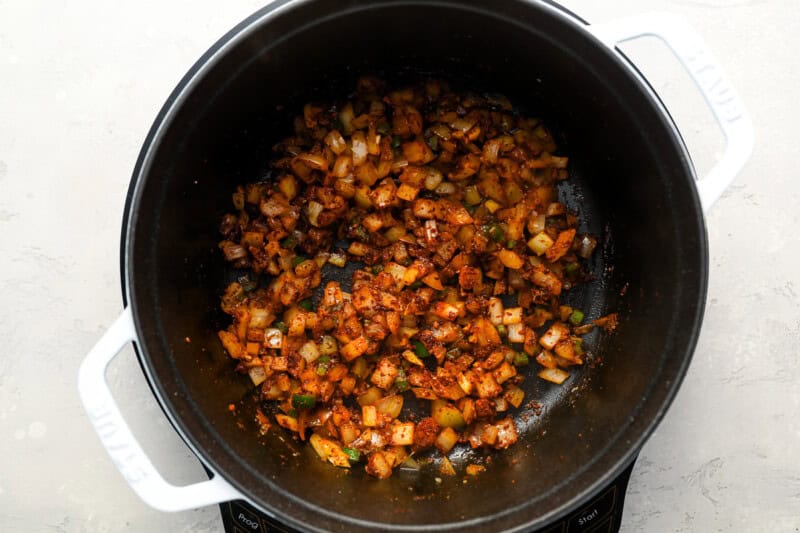 sauteed seasoned onions in a dutch oven.