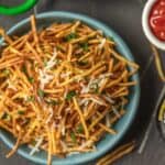 a bowl of shoestring fries