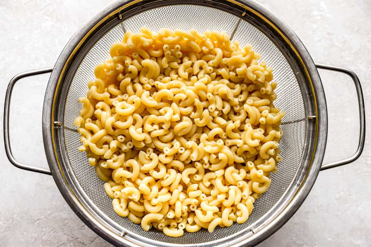 cooked macaroni in a colander.