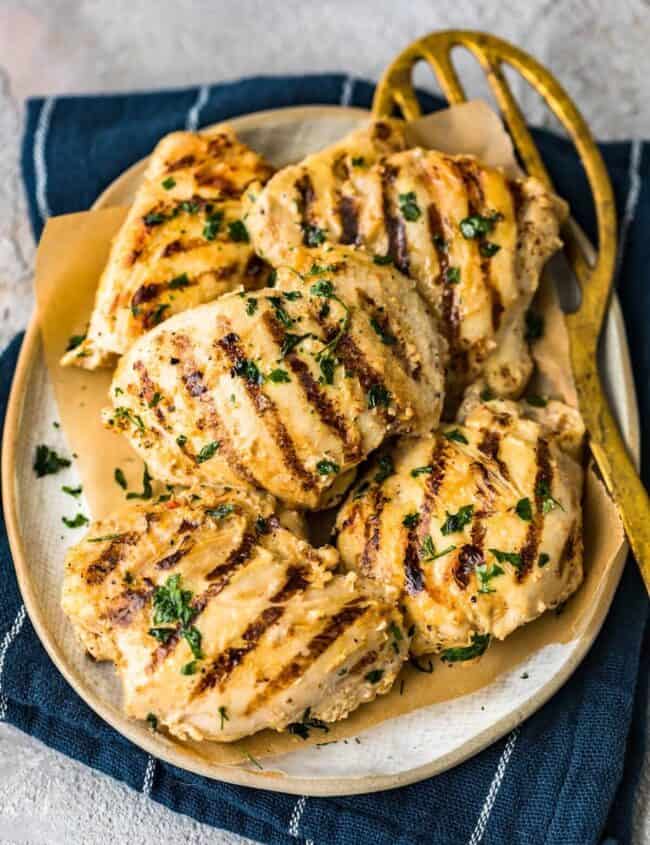 grilled yogurt marinated chicken thighs on platter