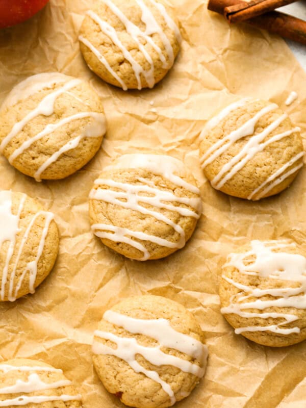 overhead view of apple cider cookies on parchment paper.