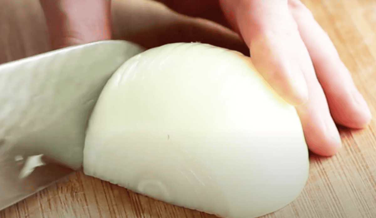 Dicing an onion.