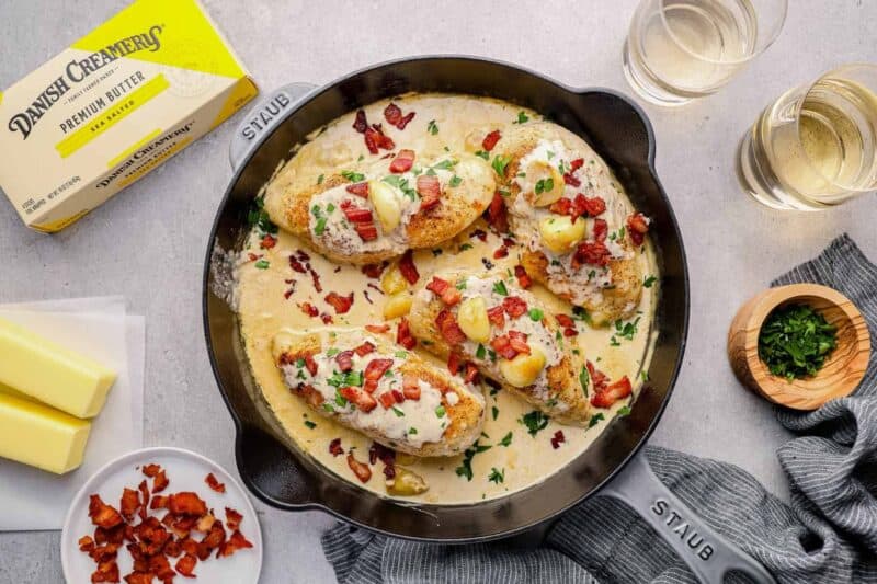 creamy garlic chicken with bacon in a skillet