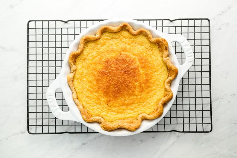 baked buttermilk pie in a pie pan.