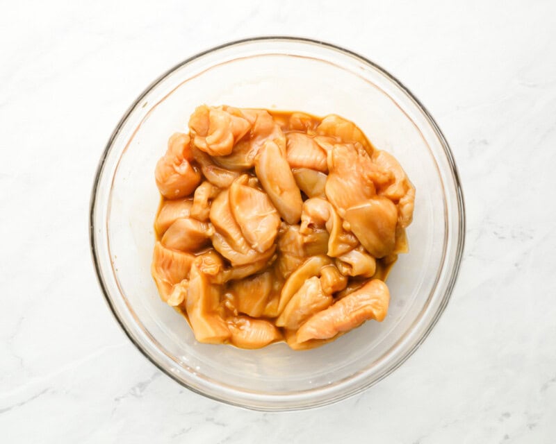 marinated chicken in a glass bowl