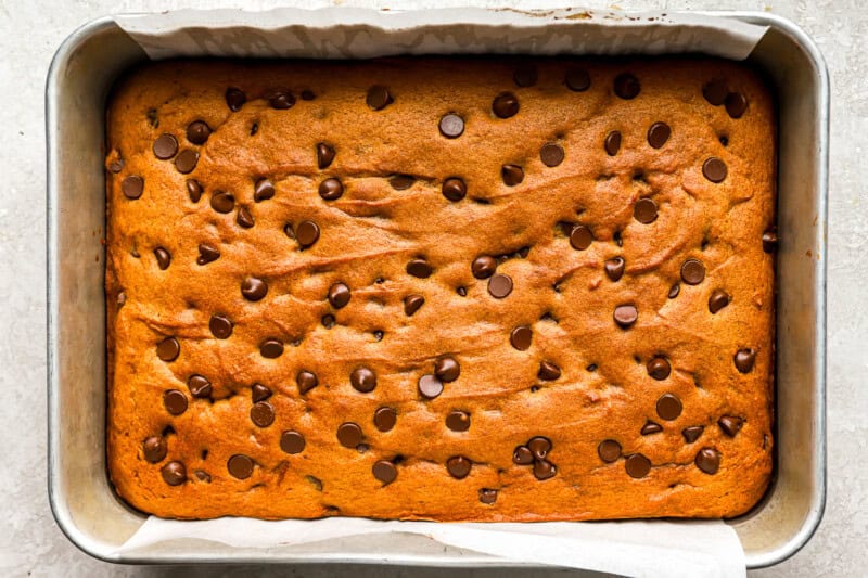 baked pumpkin cookie bars in a baking pan.