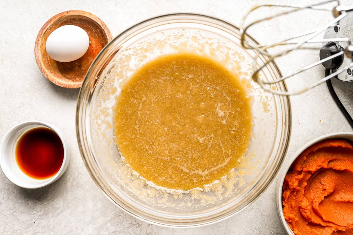 created butter and sugar in a glass bowl.