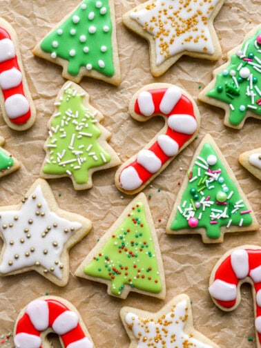 overhead view of frosted christmas cutout cookies.