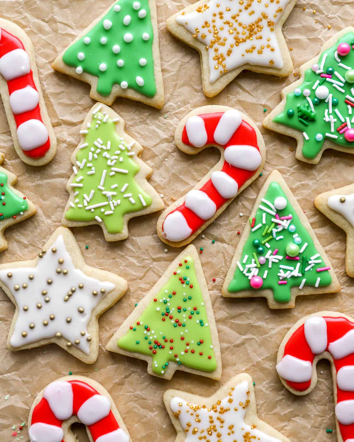 overhead view of frosted christmas cutout cookies.