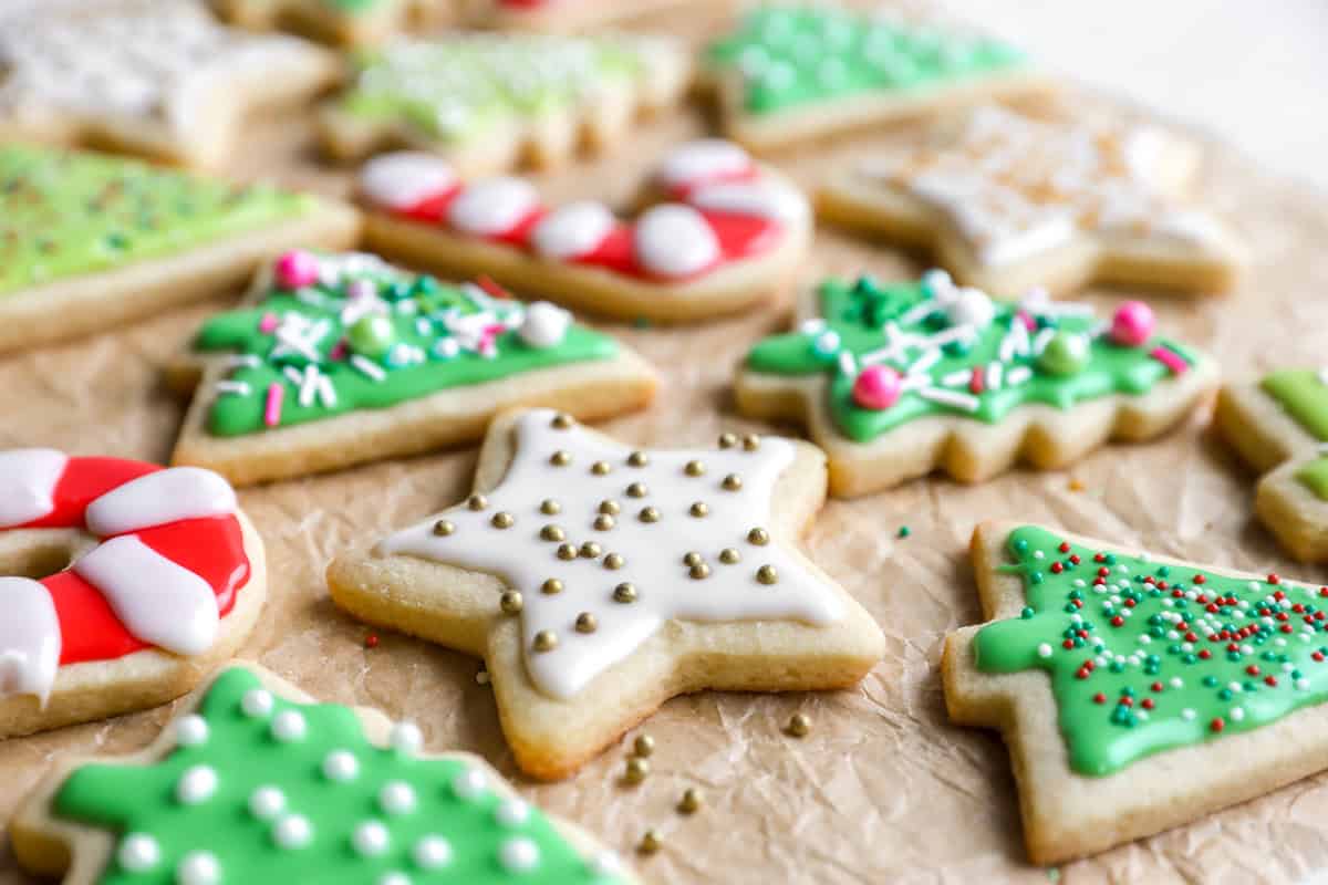 three-quarters view of frosted christmas cutout cookies.