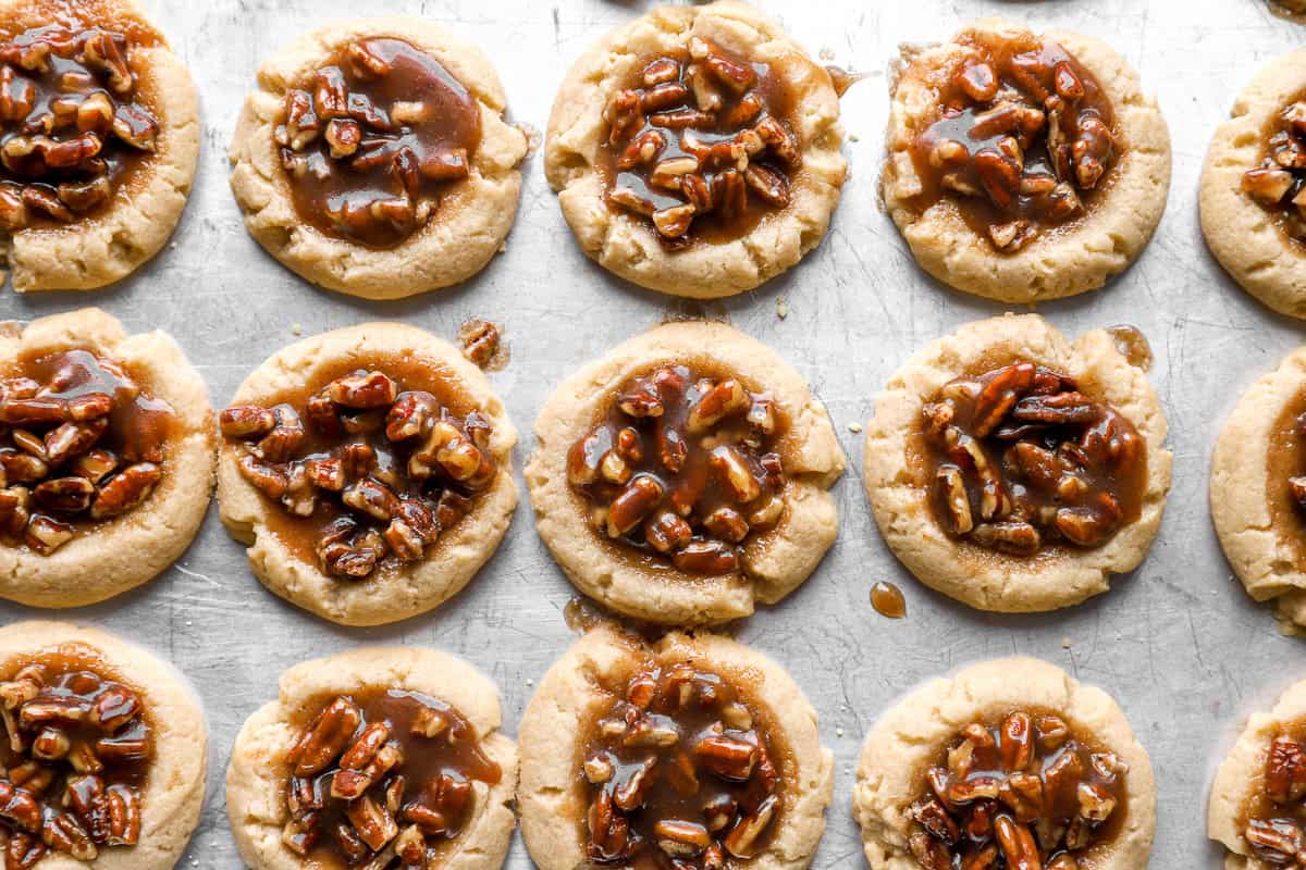 baked pecan pie cookies on a baking sheet.