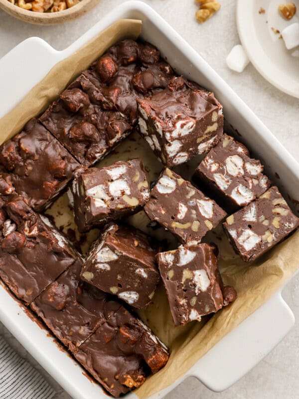 overhead view of partially cut rocky road fudge squares in a baking pan.