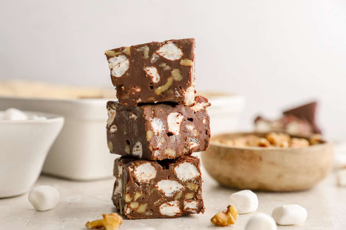 a stack of 3 pieces of rocky road fudge.