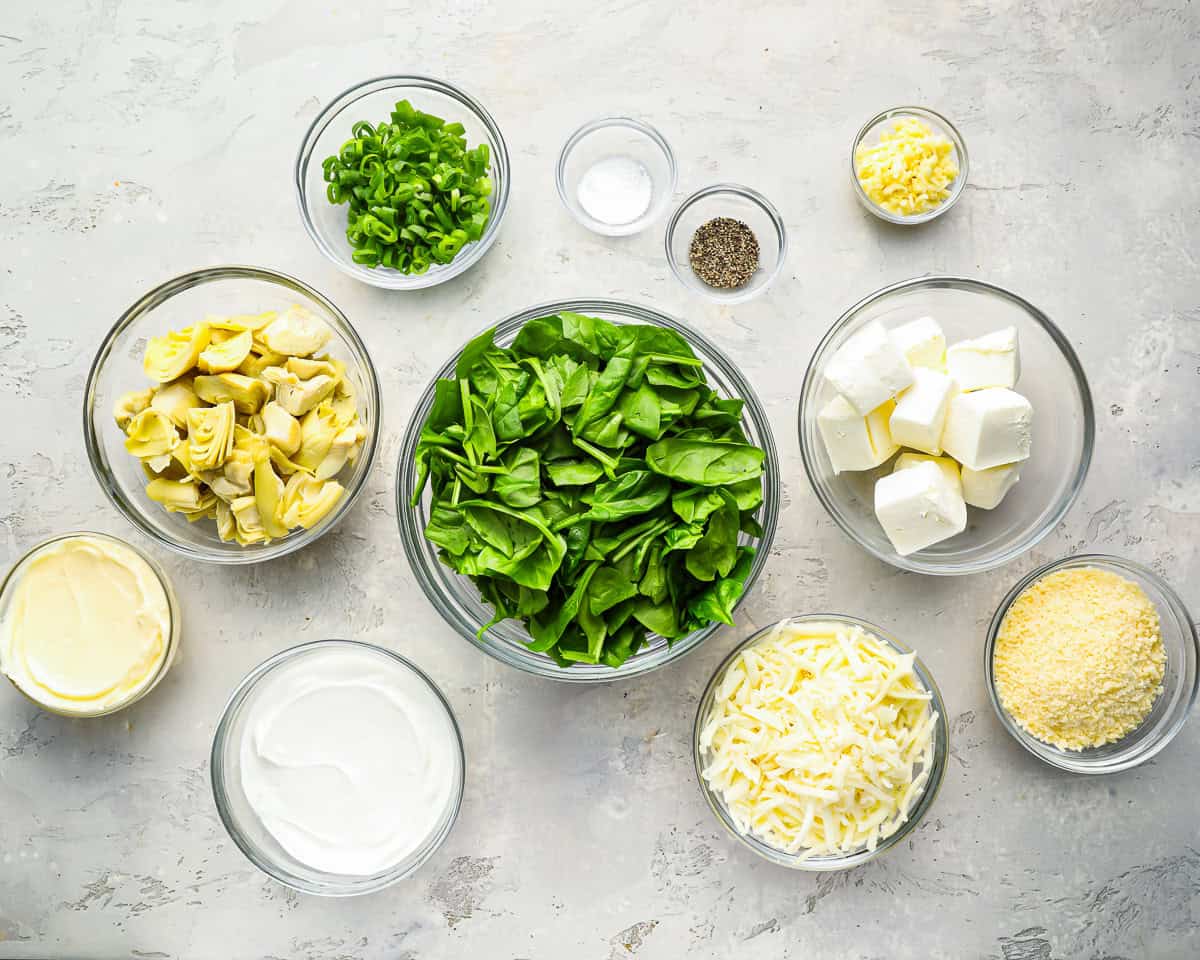 ingredients for crockpot spinach artichoke dip.